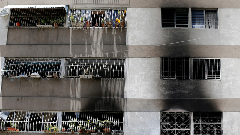 Signs of smoke on an apartment complex near the site of the explosions.